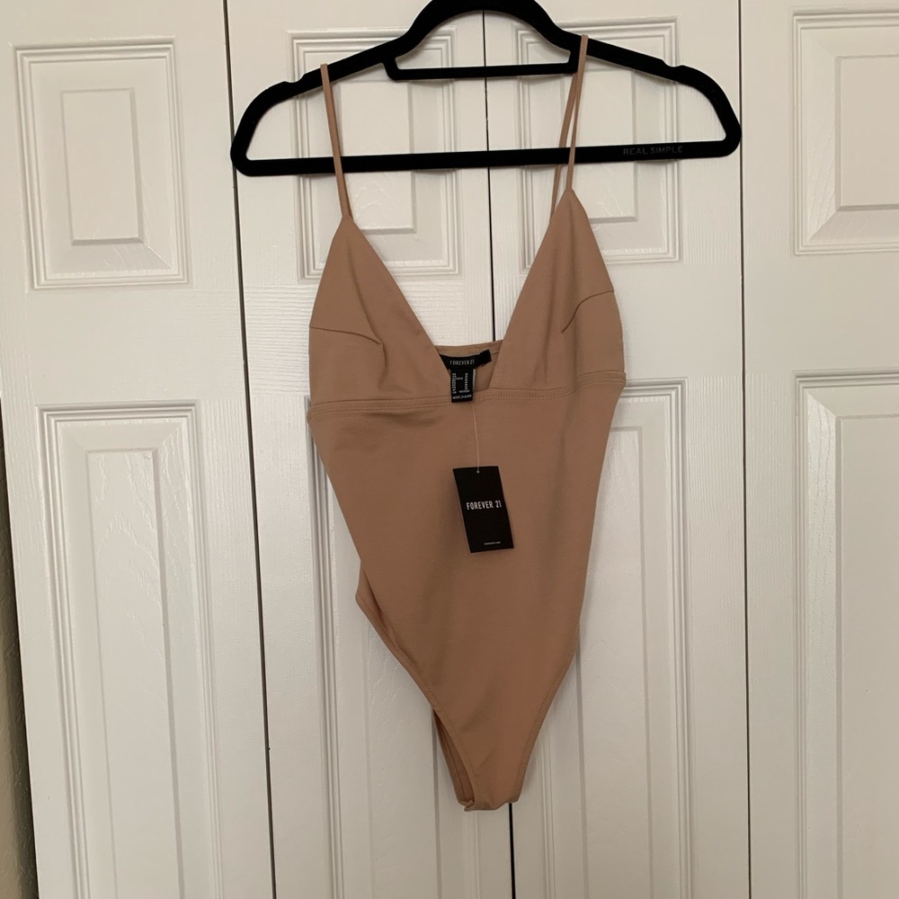 Light beige body suit